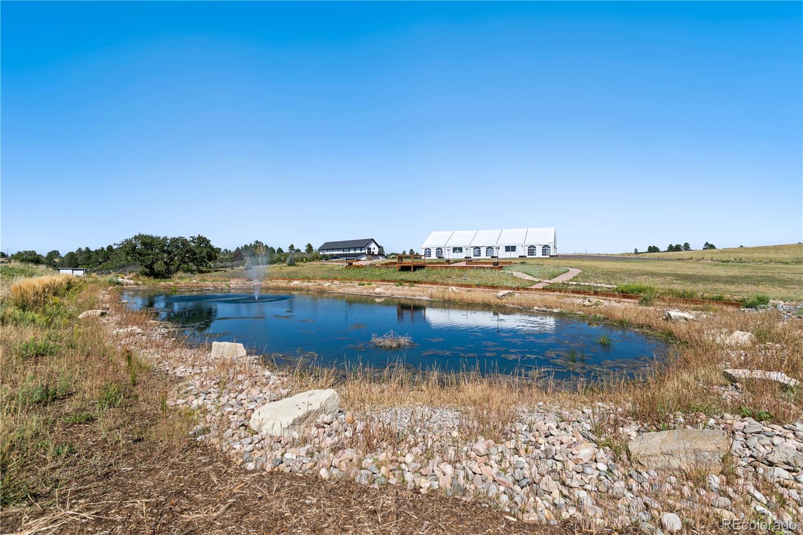 Lot 4 Wildstone Ranch Elbert, CO 80106 - Photo 25 of 42 a view of a lake with a city