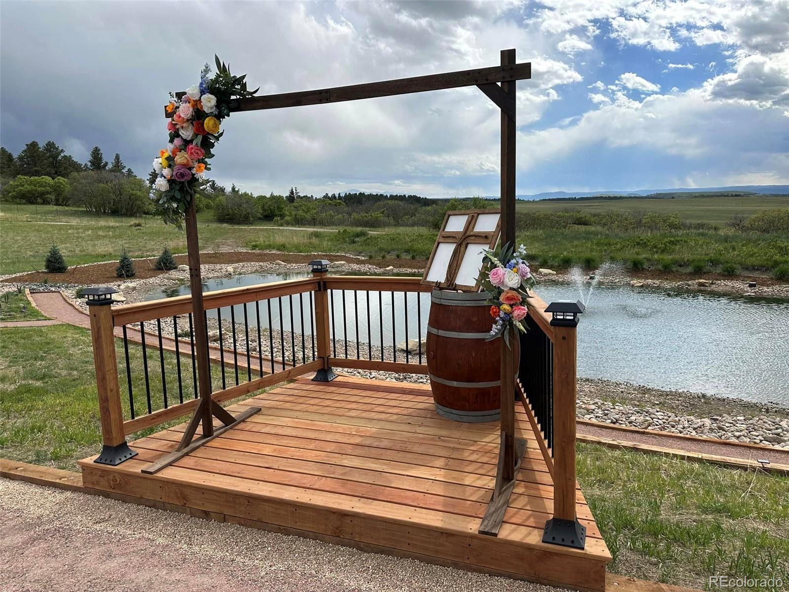 Lot 4 Wildstone Ranch Elbert, CO 80106 - Photo 8 of 42 a view of a porch with furniture and a yard