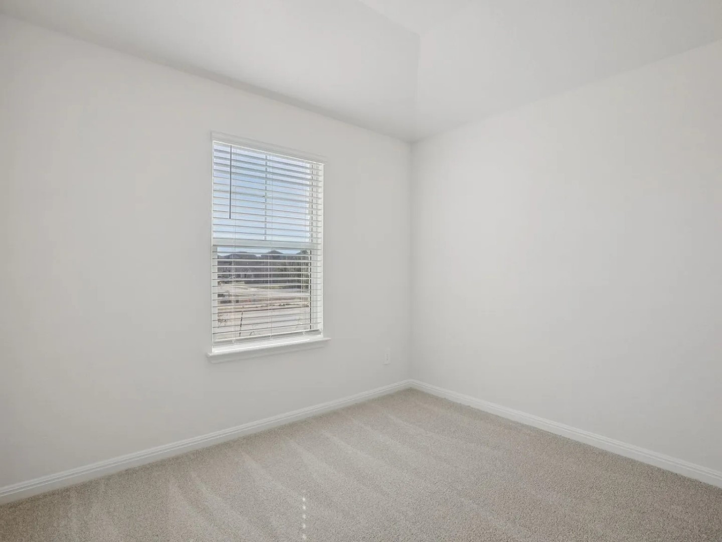 486 El Capitan Loop Dripping Springs, TX 78620 - Photo 11 of 20 an empty room with a window