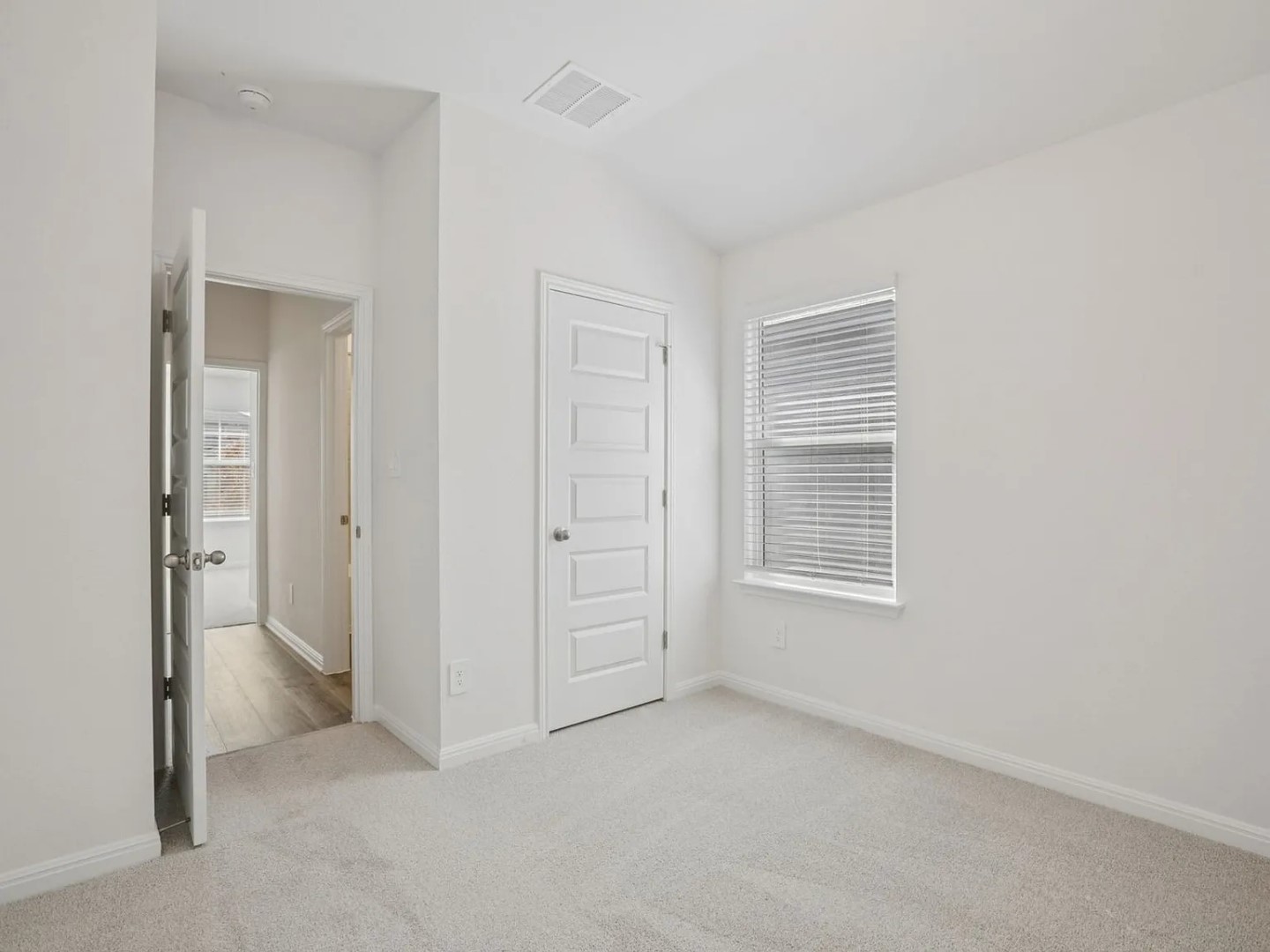 486 El Capitan Loop Dripping Springs, TX 78620 - Photo 12 of 20 an empty room with windows