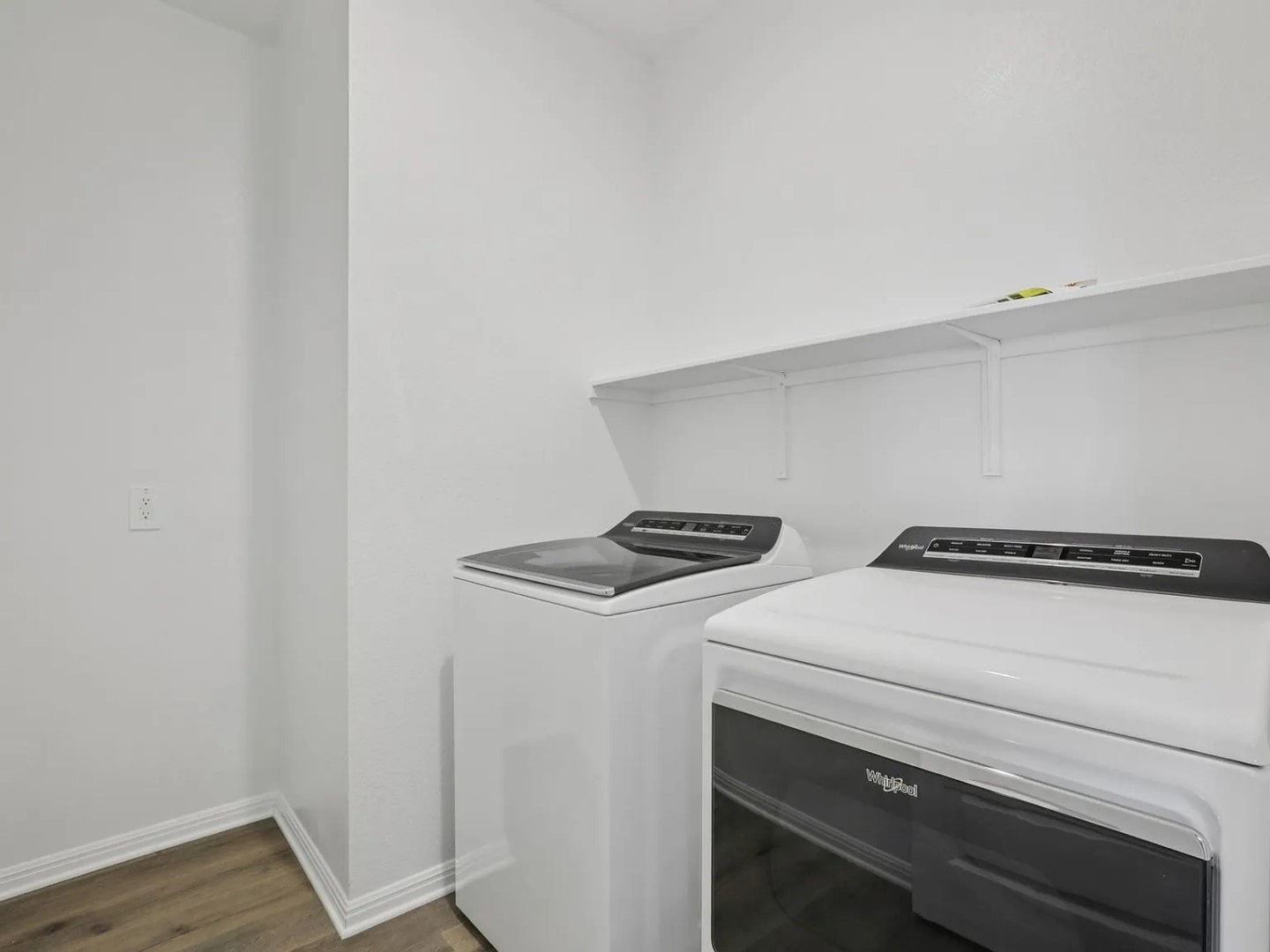 486 El Capitan Loop Dripping Springs, TX 78620 - Photo 13 of 20 a utility room with dryer and washer