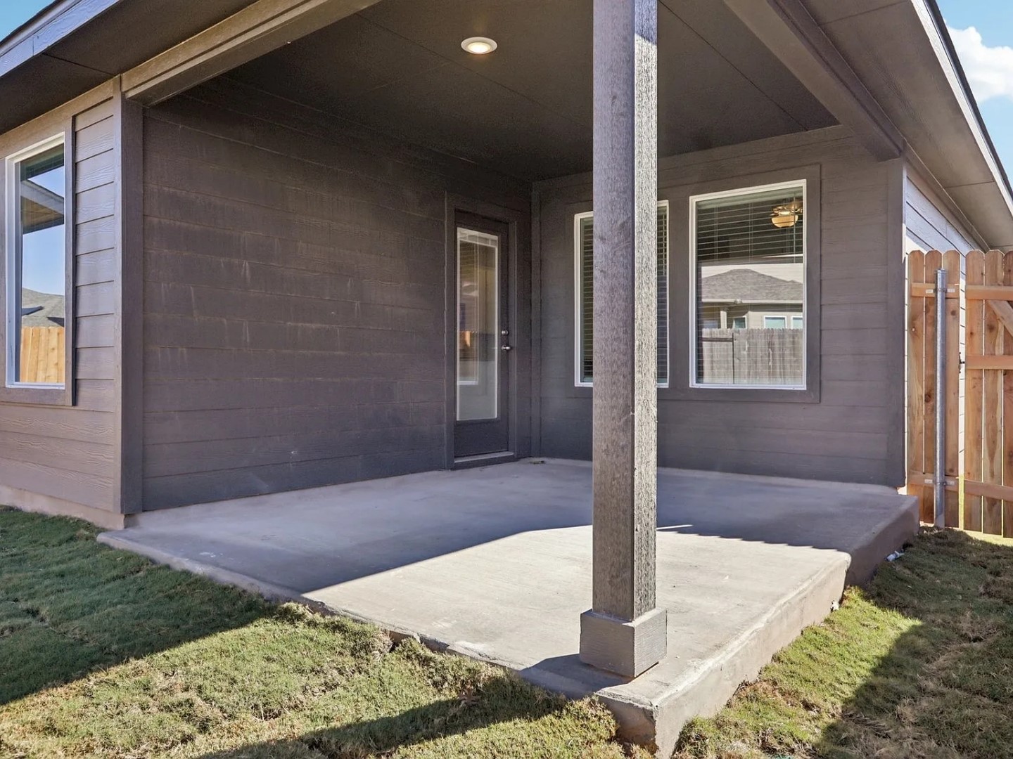 486 El Capitan Loop Dripping Springs, TX 78620 - Photo 14 of 20 a front view of a house with garden