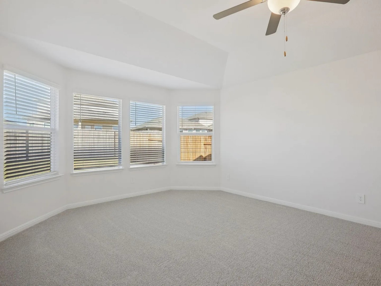 486 El Capitan Loop Dripping Springs, TX 78620 - Photo 7 of 20 an empty room with windows