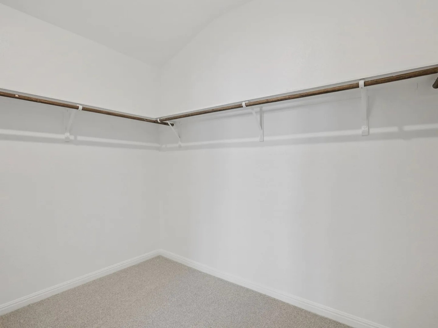 486 El Capitan Loop Dripping Springs, TX 78620 - Photo 8 of 20 a view of an empty walk in closet