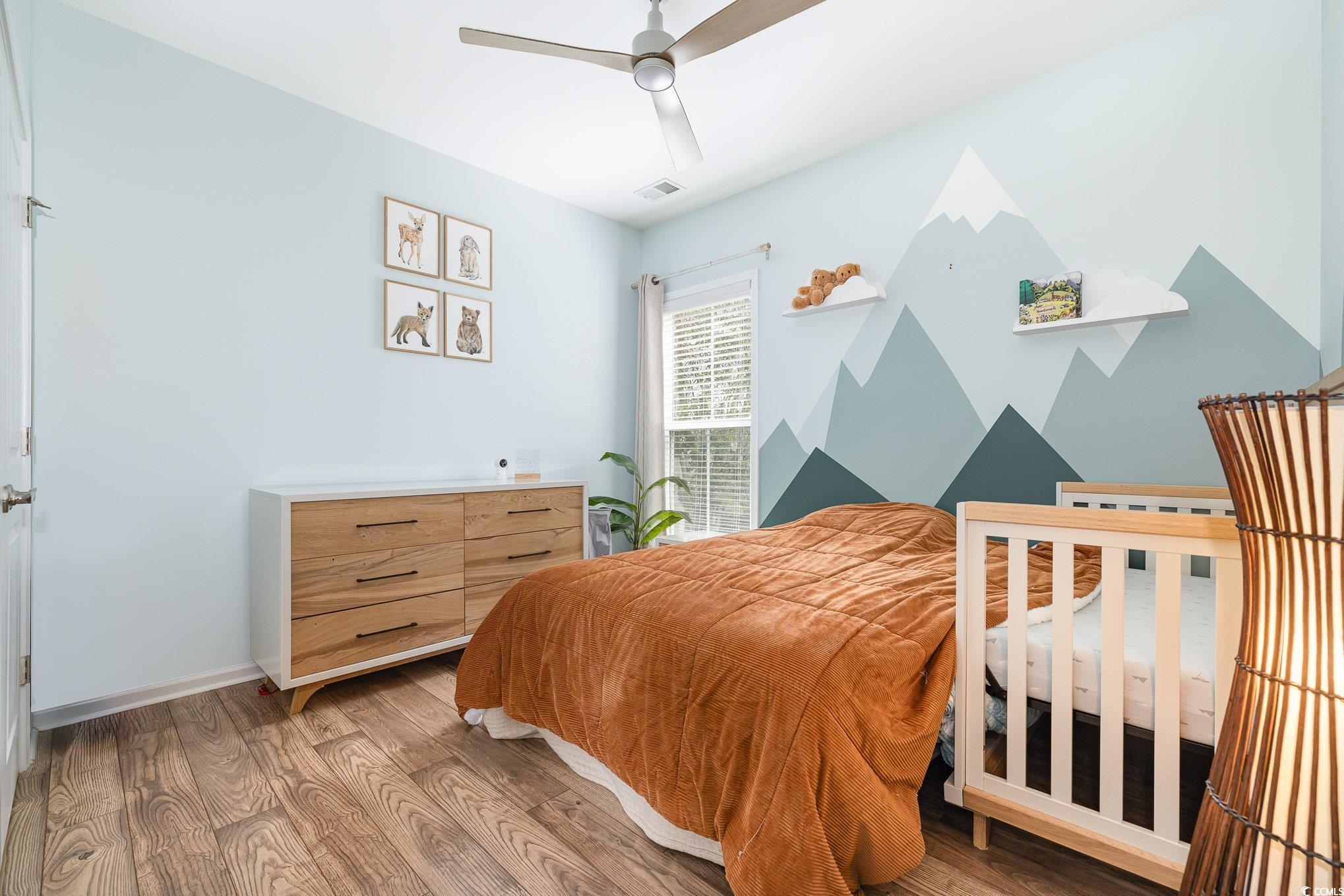 136 Splendor Circle Murrells Inlet, SC 29576 - Photo 11 of 30 Bedroom featuring baseboards, visible vents, light wood-style flooring, and a ceiling fan