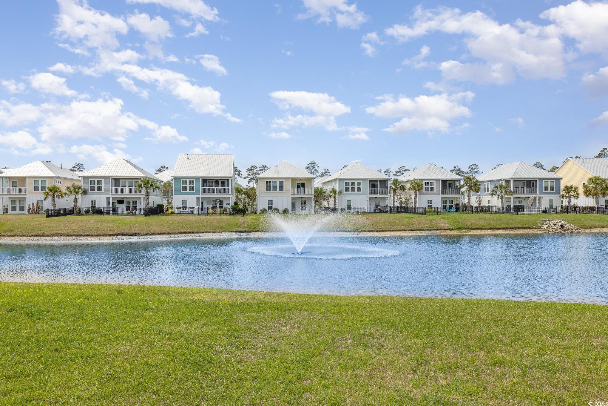 136 Splendor Circle Murrells Inlet, SC 29576 - Photo 27 of 30 View of water feature with a residential view