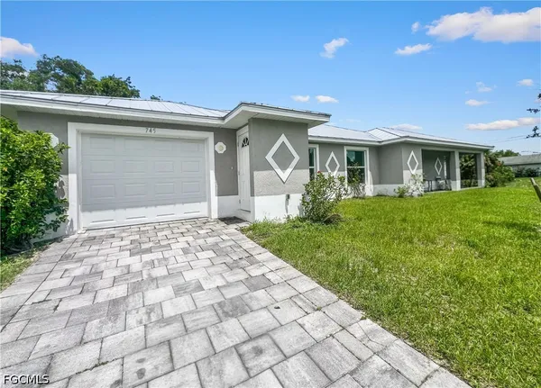 $1,699 | 745 Harry Avenue South, Lehigh Acres, FL 33973