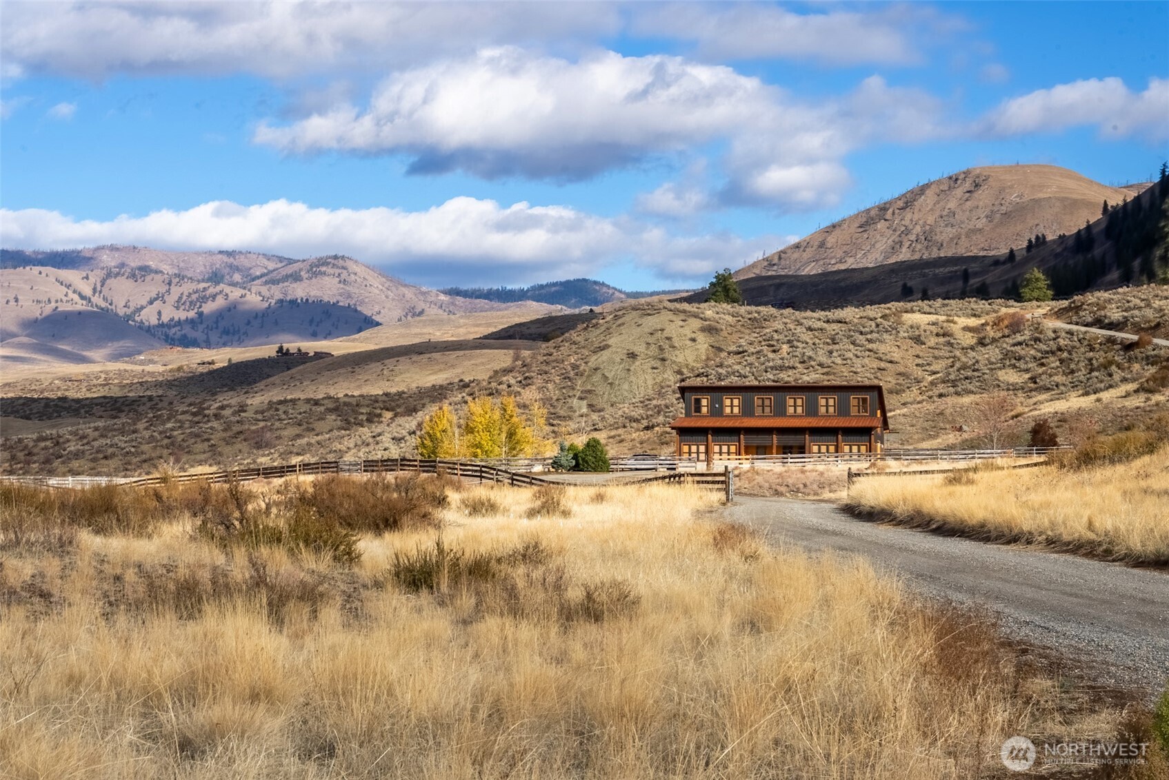 48 Thurlow Road Twisp, WA 98856 - Photo 24 of 40 a view of a houses with a yard