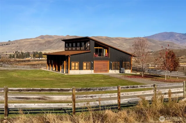 a view of a house with a ocean view