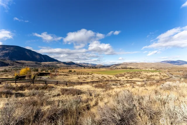 a view of an ocean with a houses