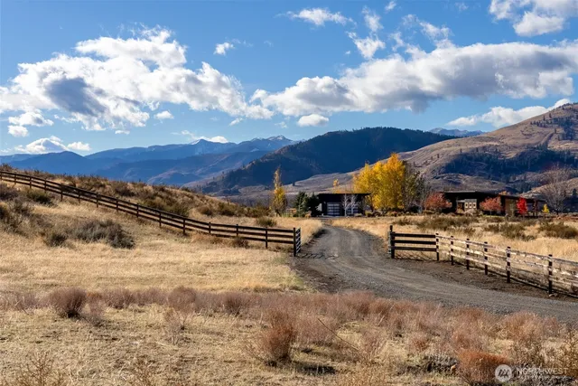 a view of a terrace with a wooden fence