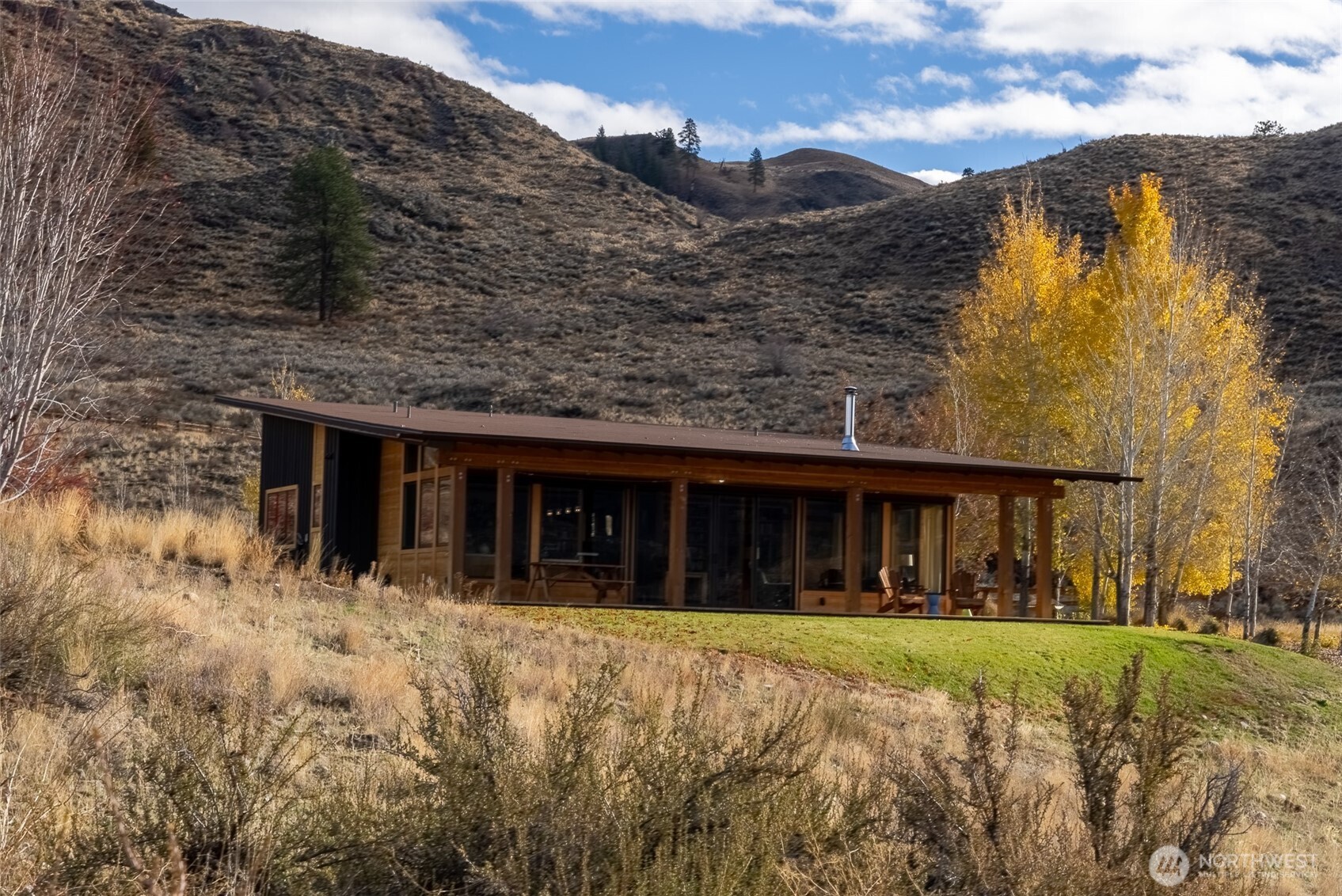 48 Thurlow Road Twisp, WA 98856 - Photo 5 of 40 front view of a house with a yard