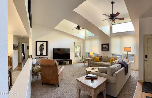 a bed room with a bed and a television