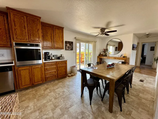 a bathroom with a sink a mirror and a toilet