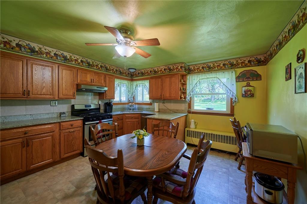2583 Highway 210 Rural Valley, PA 16249 - Photo 11 of 41 a view of a dining room with furniture and window