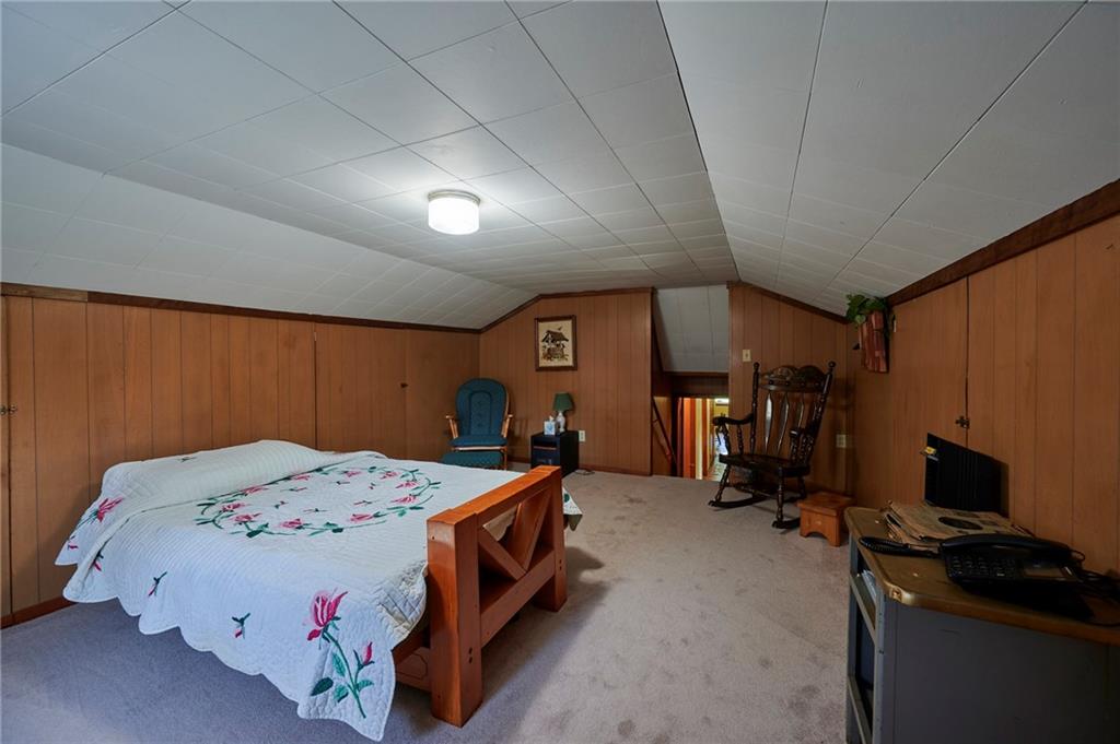 2583 Highway 210 Rural Valley, PA 16249 - Photo 18 of 41 a bedroom with a bed and a desk