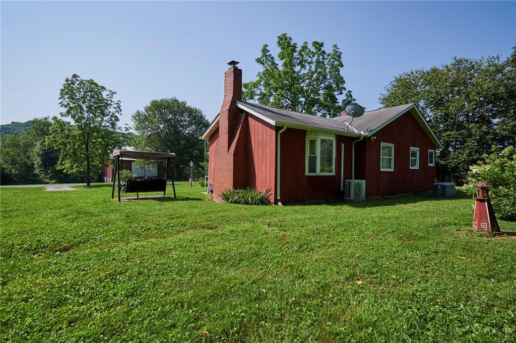 2583 Highway 210 Rural Valley, PA 16249 - Photo 22 of 41 a view of a house with backyard and garden