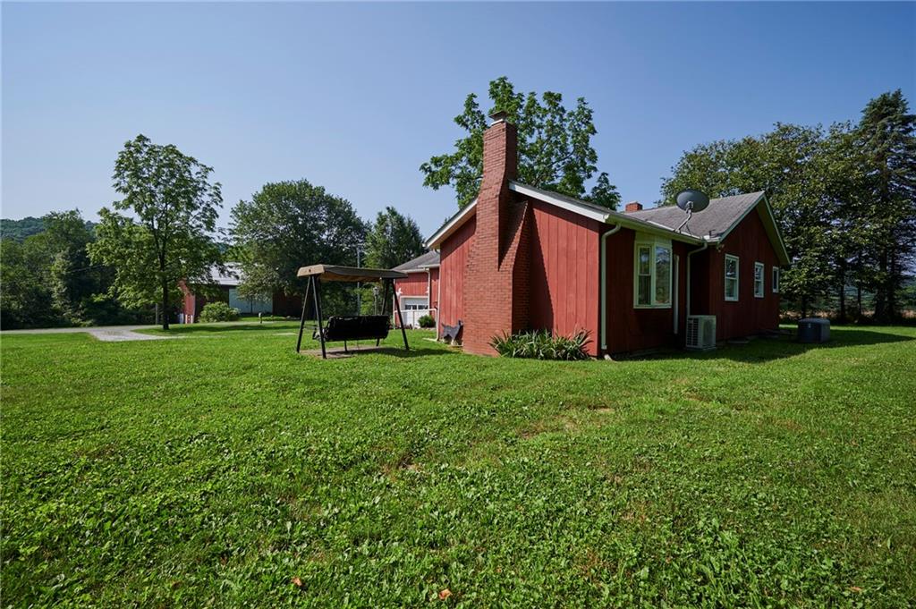 2583 Highway 210 Rural Valley, PA 16249 - Photo 23 of 41 a view of a house with backyard and garden