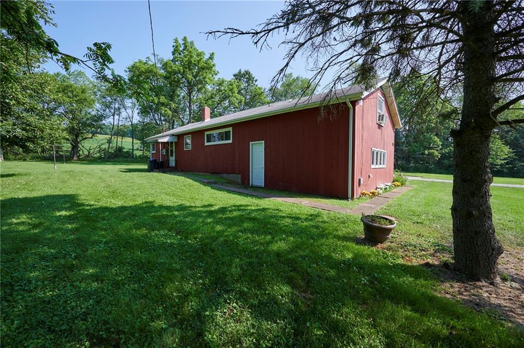 2583 Highway 210 Rural Valley, PA 16249 - Photo 24 of 41 a backyard of a house with lots of green space
