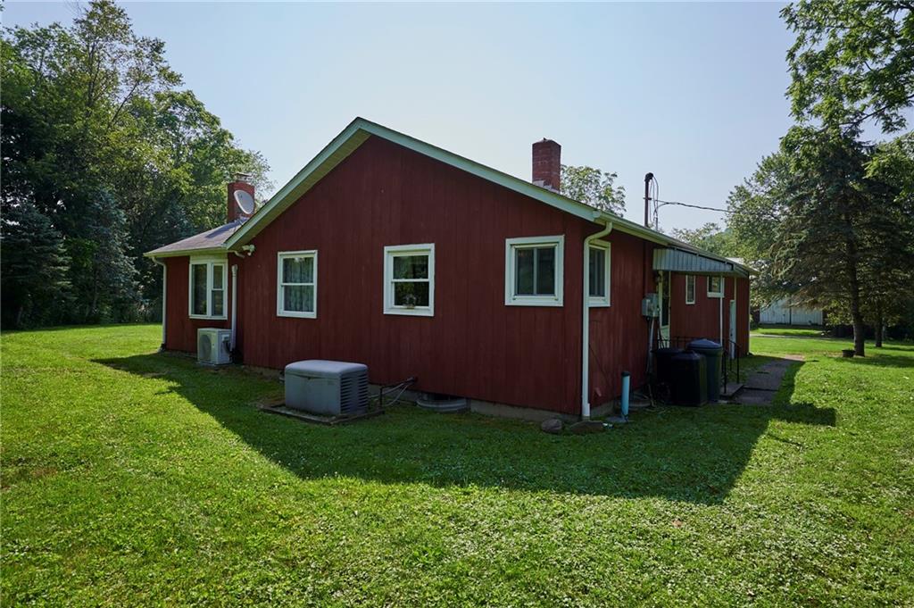 2583 Highway 210 Rural Valley, PA 16249 - Photo 25 of 41 a front view of a house with garden