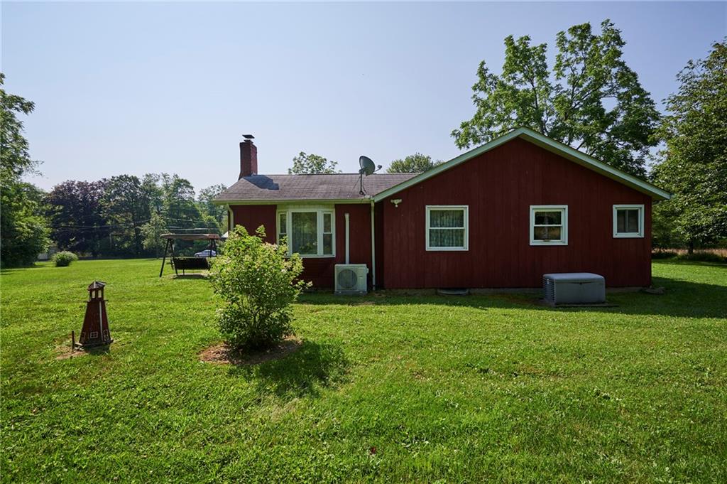 2583 Highway 210 Rural Valley, PA 16249 - Photo 26 of 41 a front view of a house with a yard