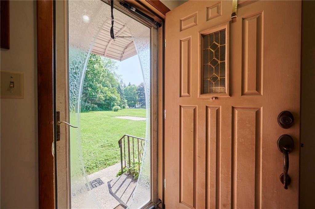 2583 Highway 210 Rural Valley, PA 16249 - Photo 3 of 41 a view of a balcony with a floor to ceiling window and wooden floor