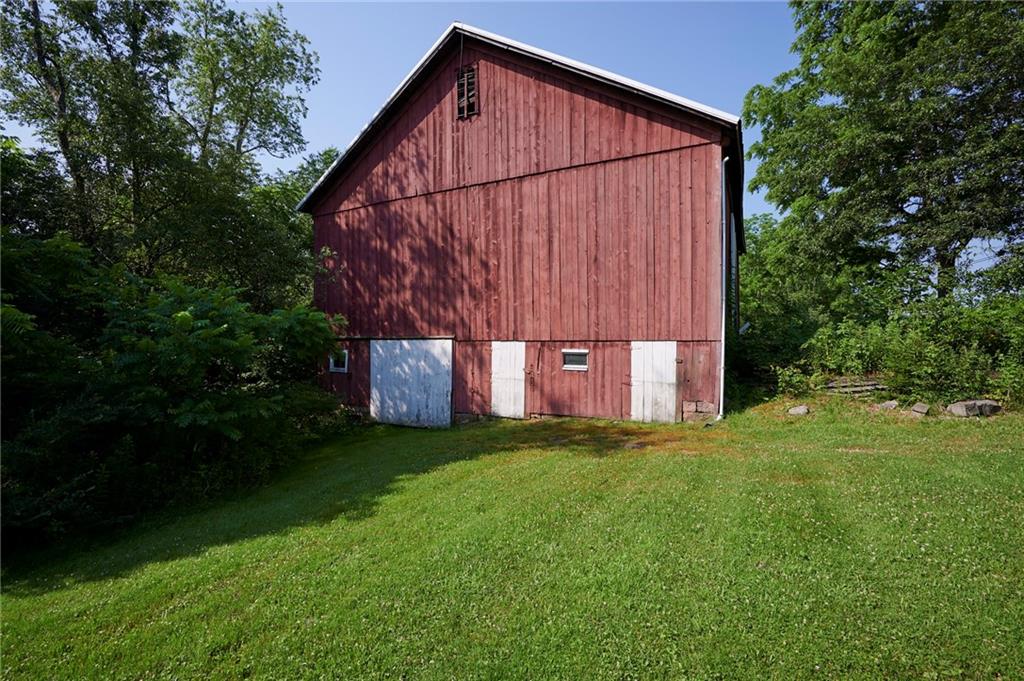 2583 Highway 210 Rural Valley, PA 16249 - Photo 37 of 41 a view of backyard with garden and trees