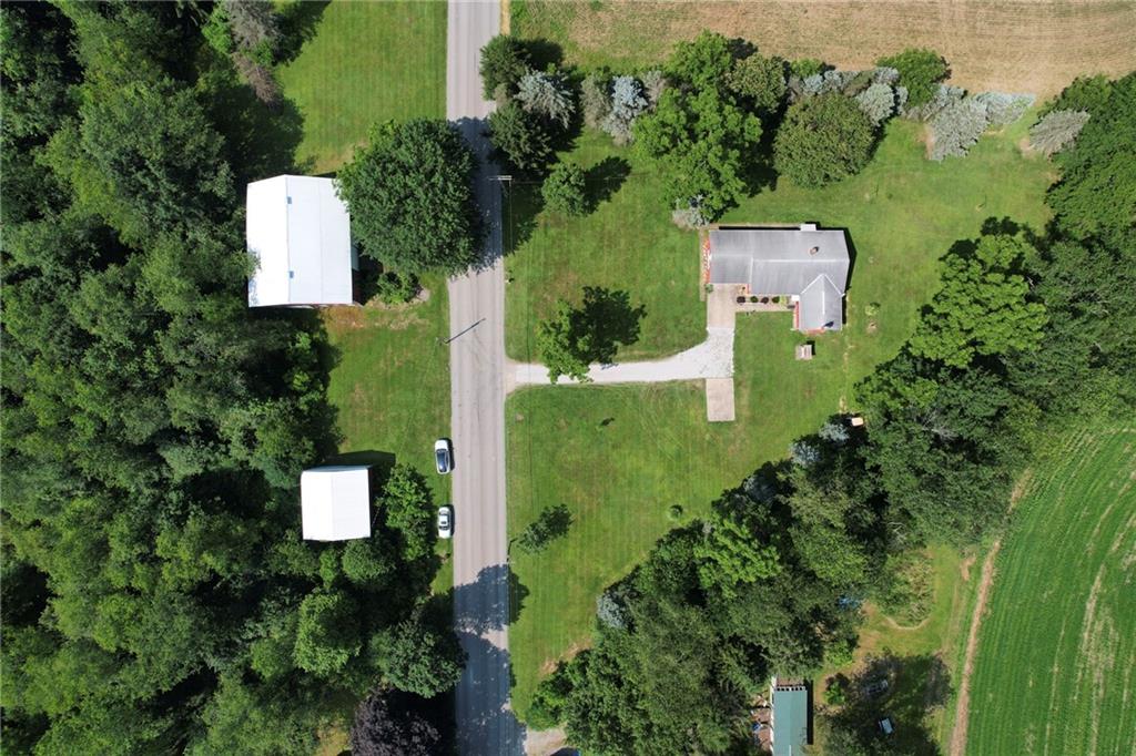 2583 Highway 210 Rural Valley, PA 16249 - Photo 40 of 41 an aerial view of a house with a yard and lake view