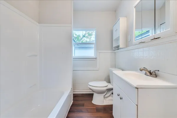 a bathroom with a sink and a toilet