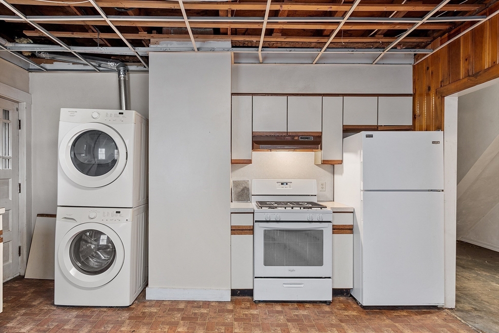51 Crescent Street Wakefield, MA 01880 - Photo 8 of 20 a utility room with dryer and washer