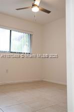 911 Northeast 199th Street, Unit 10414 Miami, FL 33179 - Photo 6 of 18 a view of water heater room