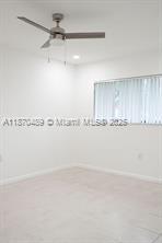 911 Northeast 199th Street, Unit 10414 Miami, FL 33179 - Photo 9 of 18 a view of white cabinets