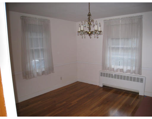 110 School Street Lexington, MA 02421 - Photo 6 of 15 a view of an empty room with a window