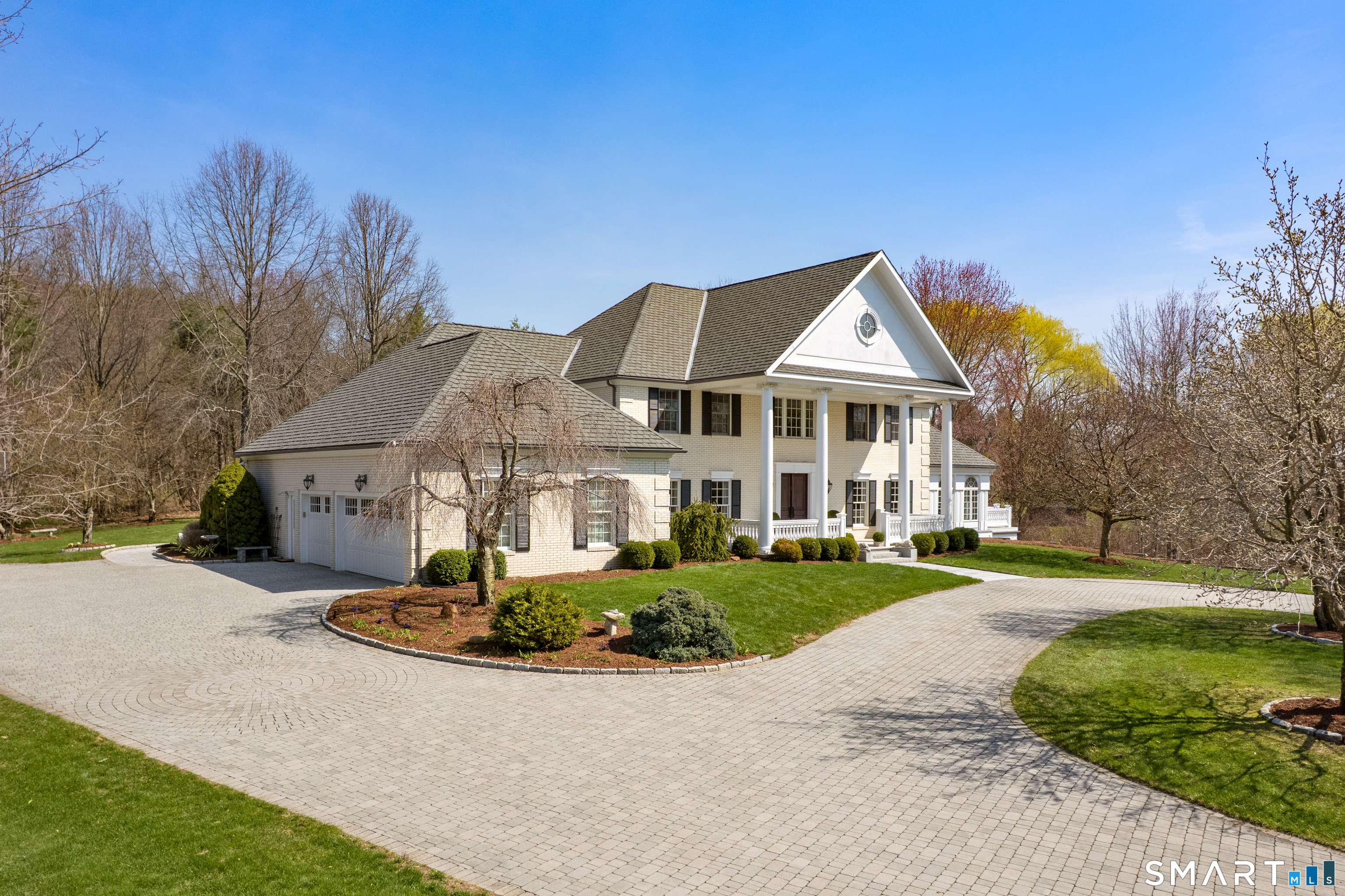 57 Thistledown Suffield, CT 06078 - Photo 34 of 39 a front view of a house with a garden