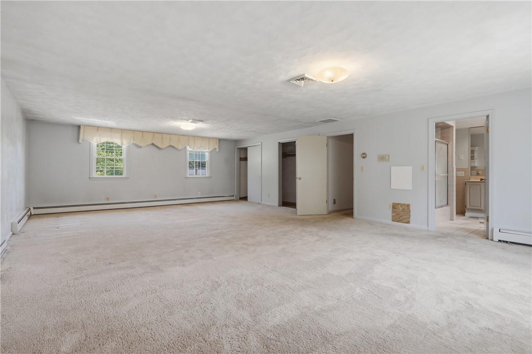 16 Old Simmonsville Road Johnston, RI 02919 - Photo 18 of 37 Large master bedroom with plenty of closet space.