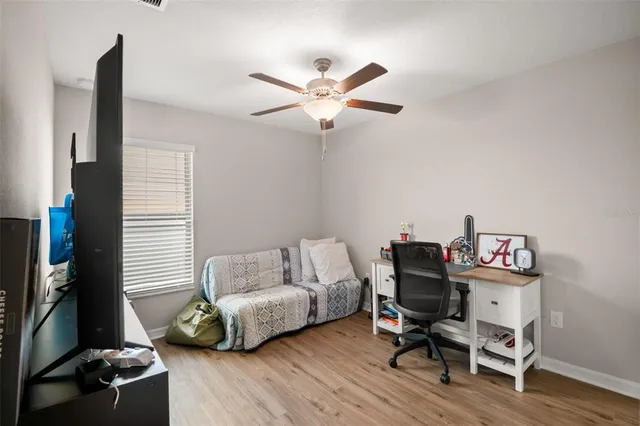 a living room with furniture and a window