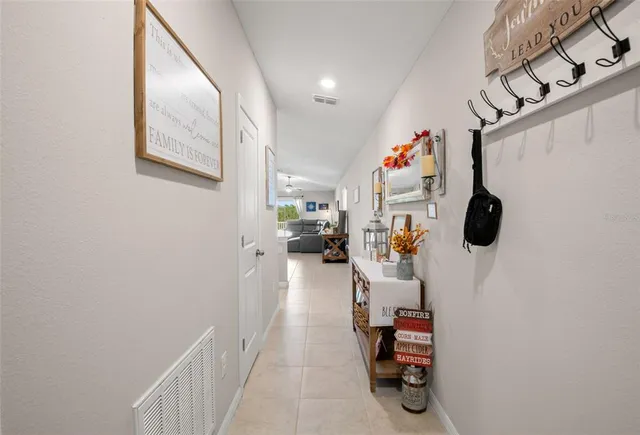 a living room with furniture and gym equipment