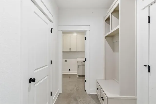 a bathroom with a tub and shower