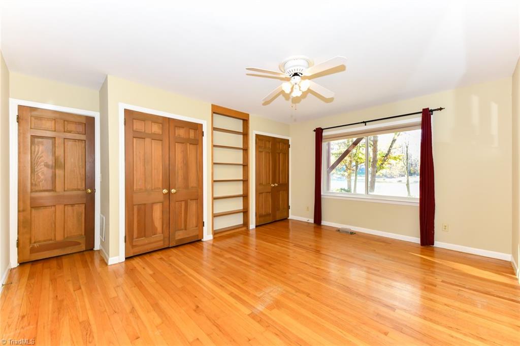 6925 Maynard Road Summerfield, NC 27358 - Photo 24 of 49 Main Level Primary Bedroom.