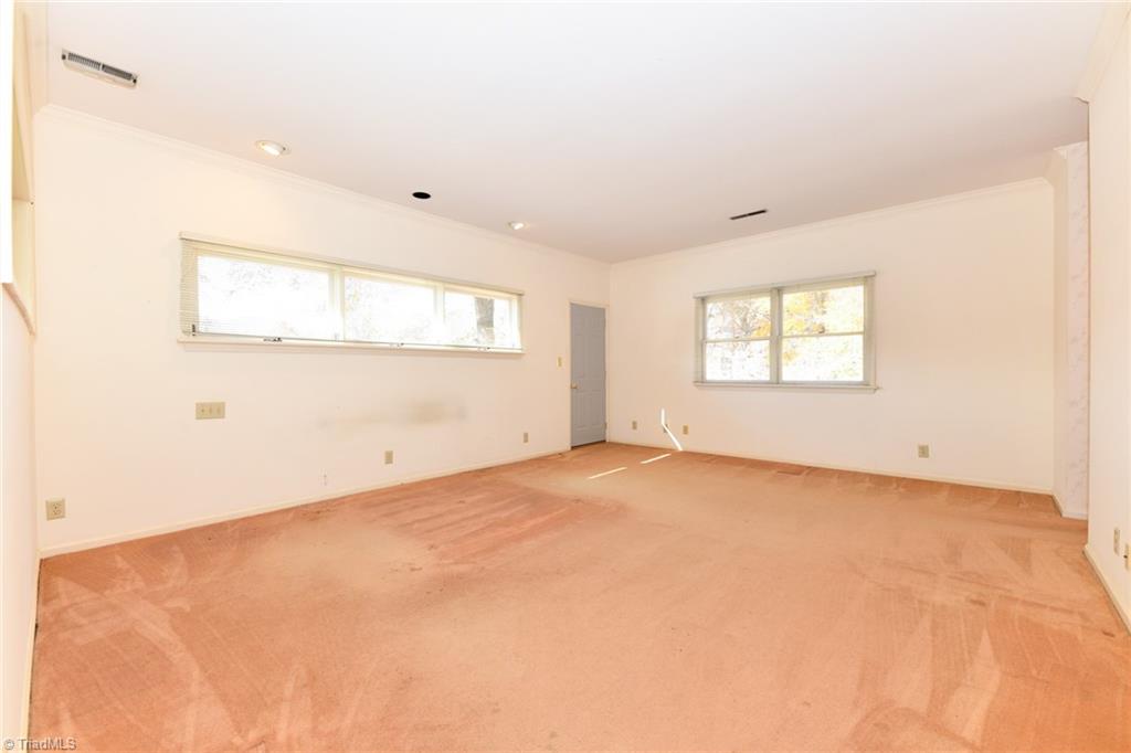 6925 Maynard Road Summerfield, NC 27358 - Photo 32 of 49 Second Level 'Other' room has exterior door access to deck.