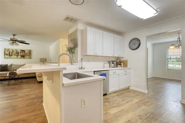 a bedroom with a large bed and a flat screen tv