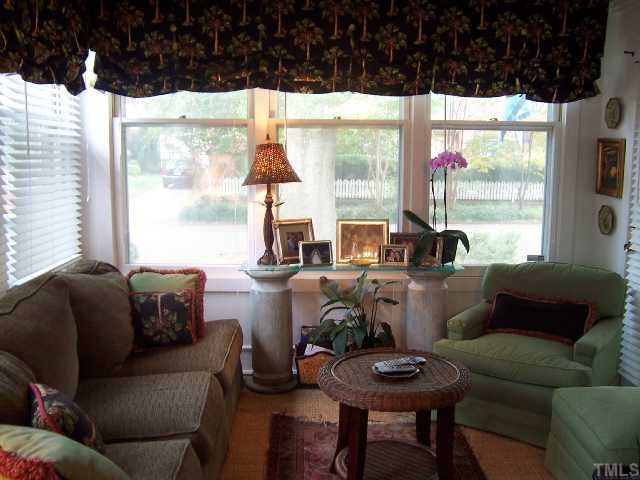 310 Morrison Avenue Raleigh, NC 27608 - Photo 4 of 12 a living room with furniture and a large window