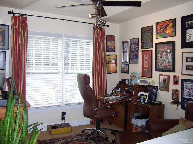 310 Morrison Avenue Raleigh, NC 27608 - Photo 9 of 12 a work room with furniture and windows