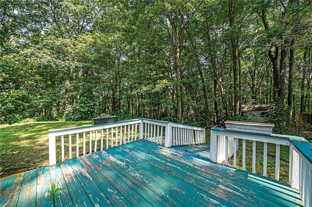 178 Whiteshill Road Rochester, PA 15074 - Photo 30 of 38 a view of a wooden deck with a yard