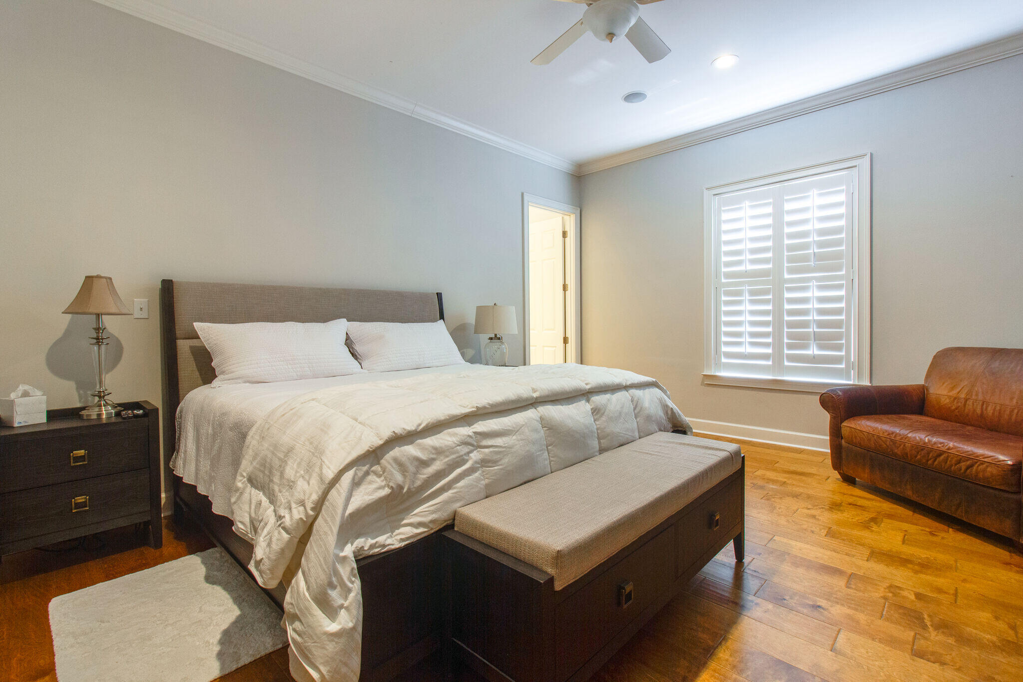 2113 Clipper Cove Miramar Beach, FL 32550 - Photo 12 of 29 a spacious bedroom with a bed and a couch