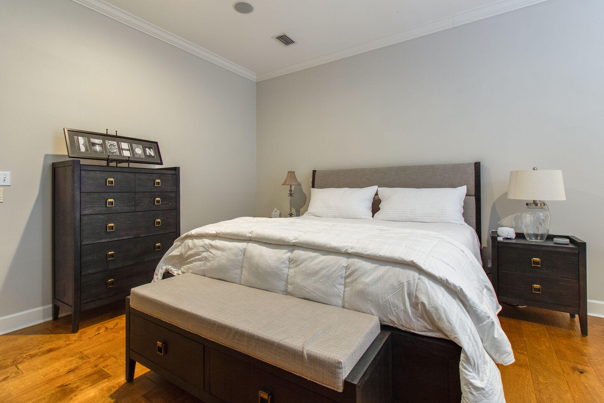2113 Clipper Cove Miramar Beach, FL 32550 - Photo 14 of 29 a bedroom with a bed and lamp
