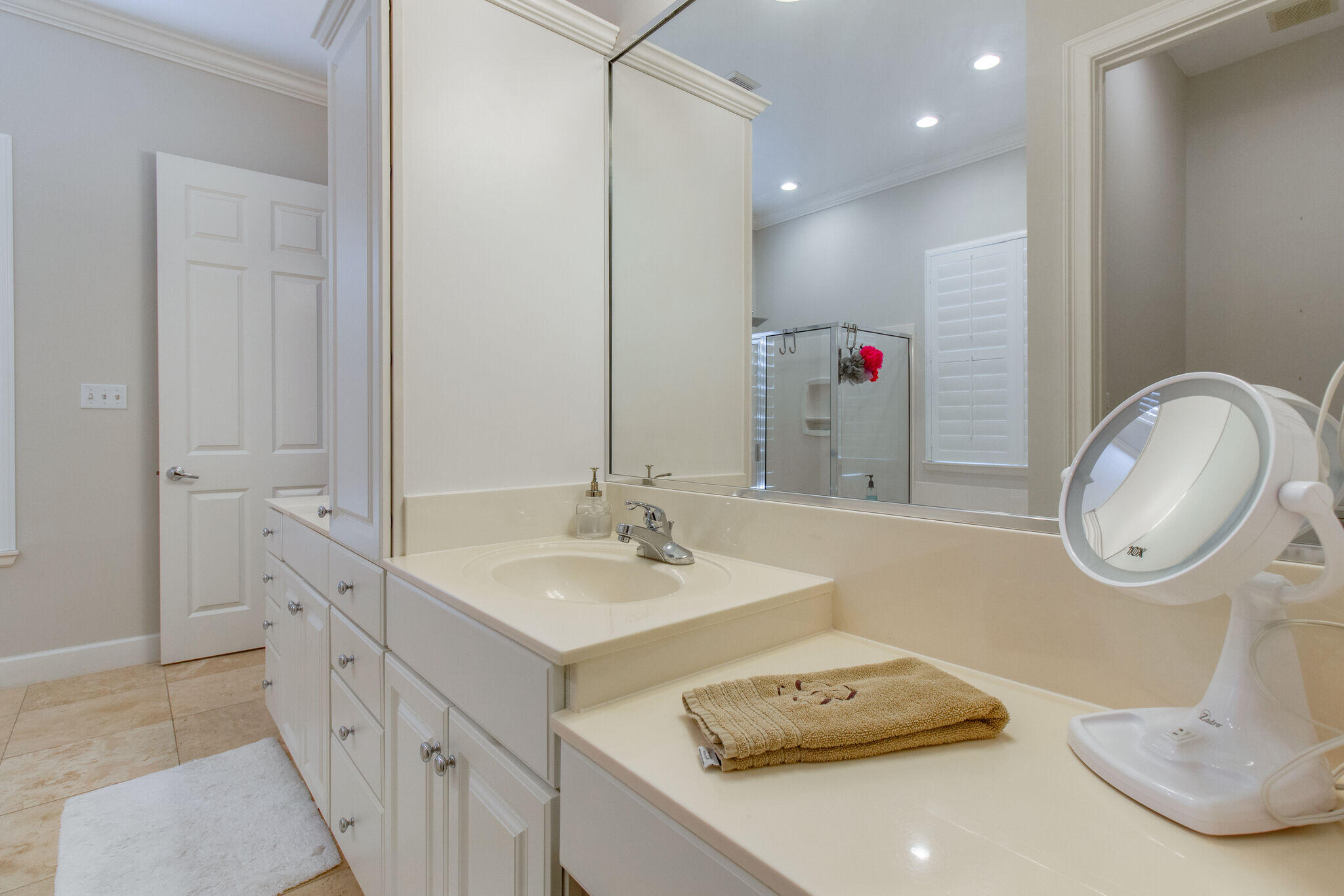 2113 Clipper Cove Miramar Beach, FL 32550 - Photo 16 of 29 a bathroom with a double vanity sink and a mirror
