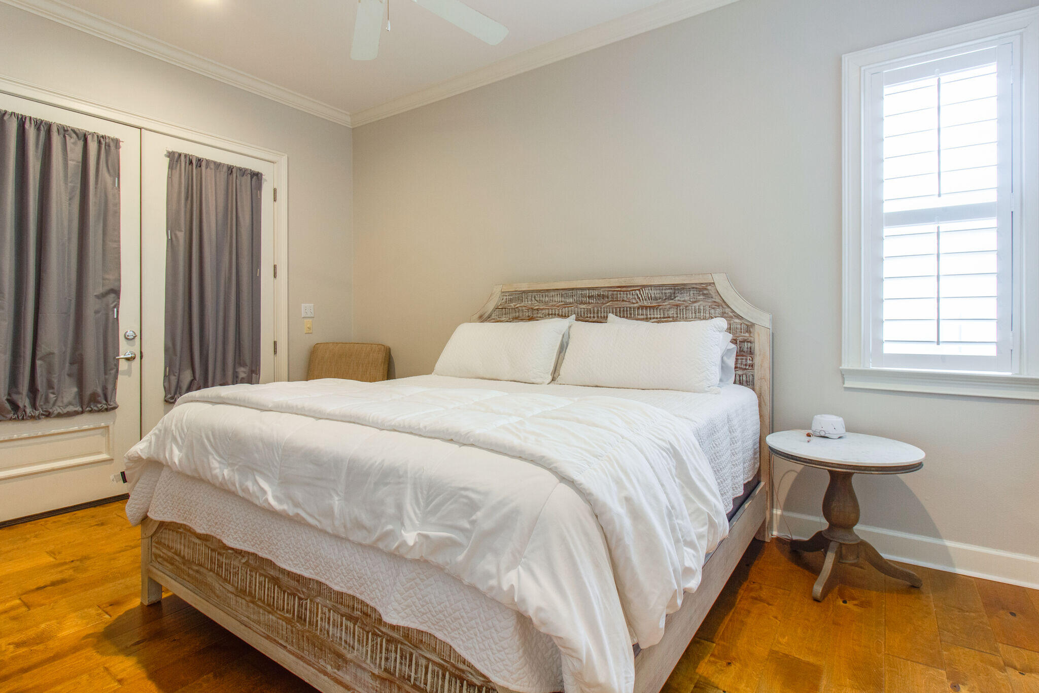 2113 Clipper Cove Miramar Beach, FL 32550 - Photo 19 of 29 a bedroom with a bed and a window