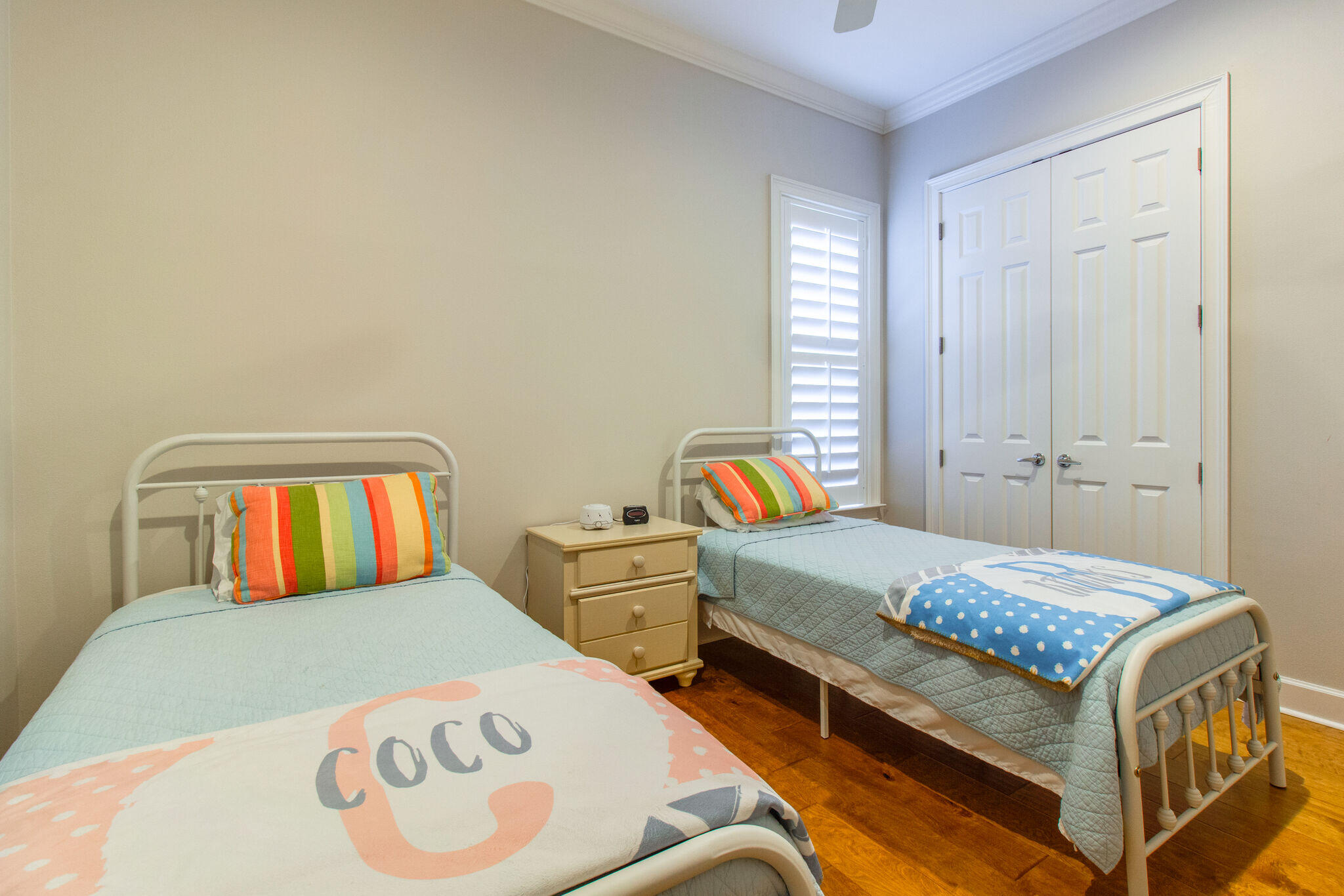 2113 Clipper Cove Miramar Beach, FL 32550 - Photo 22 of 29 a bedroom with a bed and window
