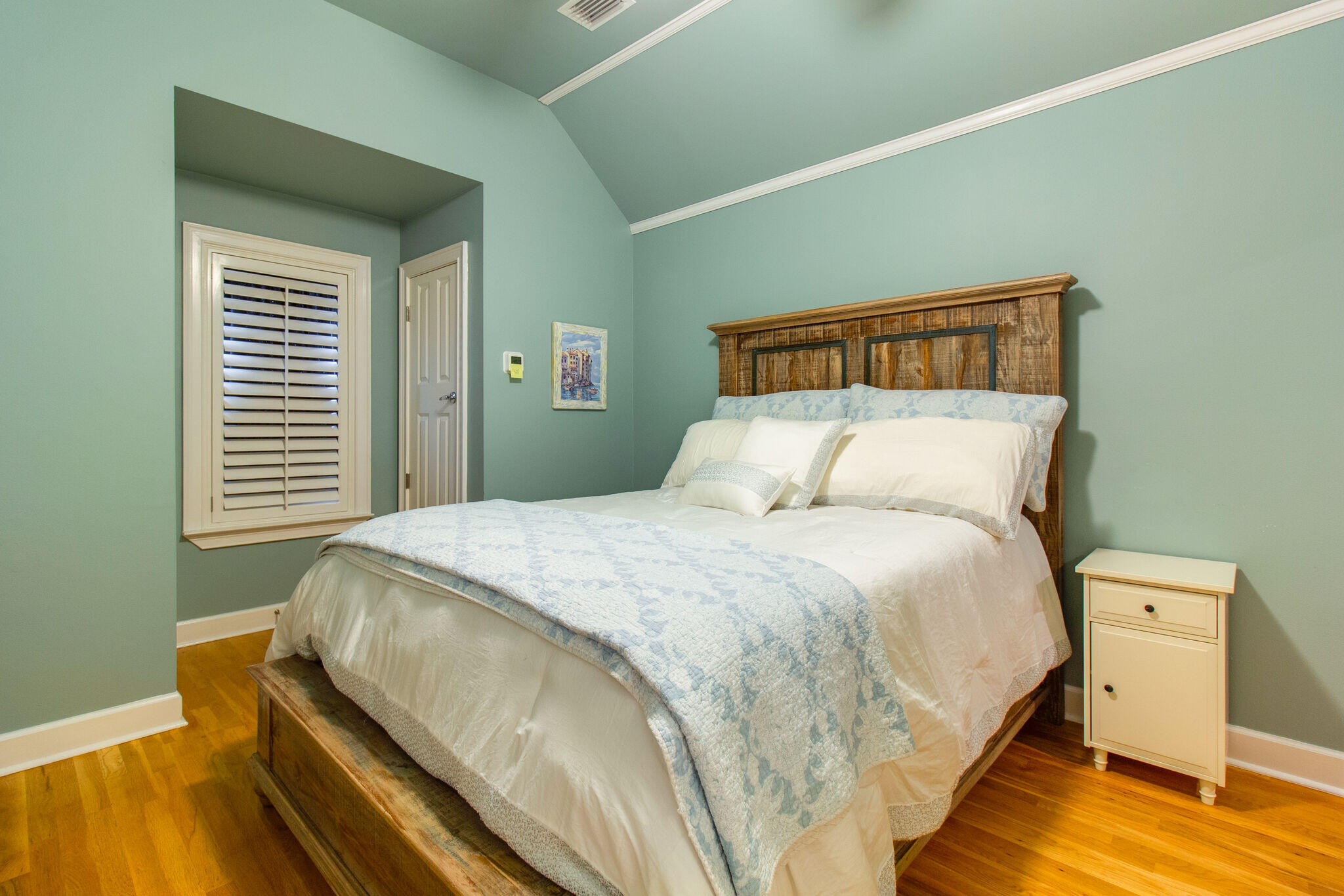 2113 Clipper Cove Miramar Beach, FL 32550 - Photo 23 of 29 a bedroom with a bed and a window